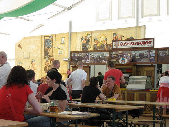Food and beer being consumed at a restaurant
