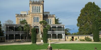 Larnach Castle and front lawn with water fountain
