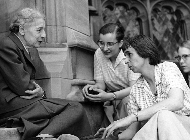 A picture of Chemist Lise Meitner with students