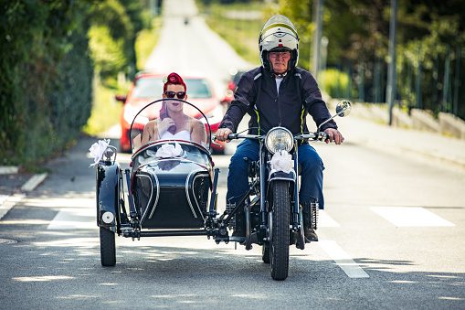 A lady riding in an Old Sidecar, Motorcycle
