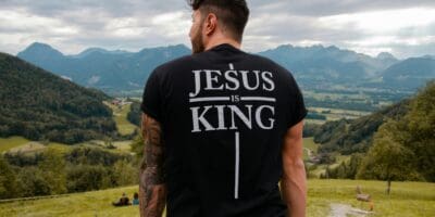 Christian man wearing a Jesus is King t-shirt