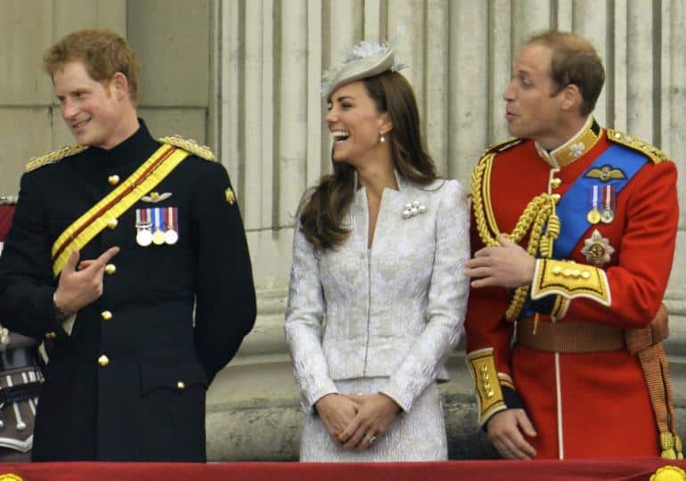 Prince Harry, Catherine, Duchess of Cambridge and Prince William, Duke of Cambridge on the balcony of Buckingham Palace