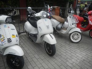 White Vespa scooters