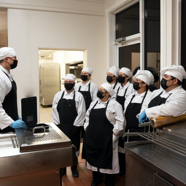 A group f people in Chef attire by MealPro - Unsplash
